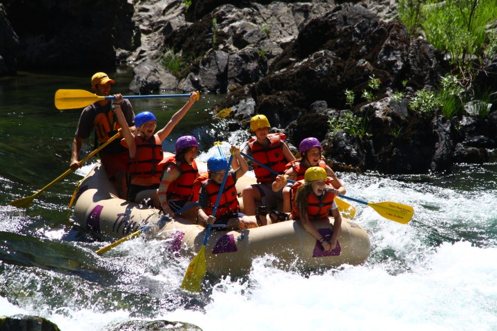 Having fun while white water rafting on the Trinity