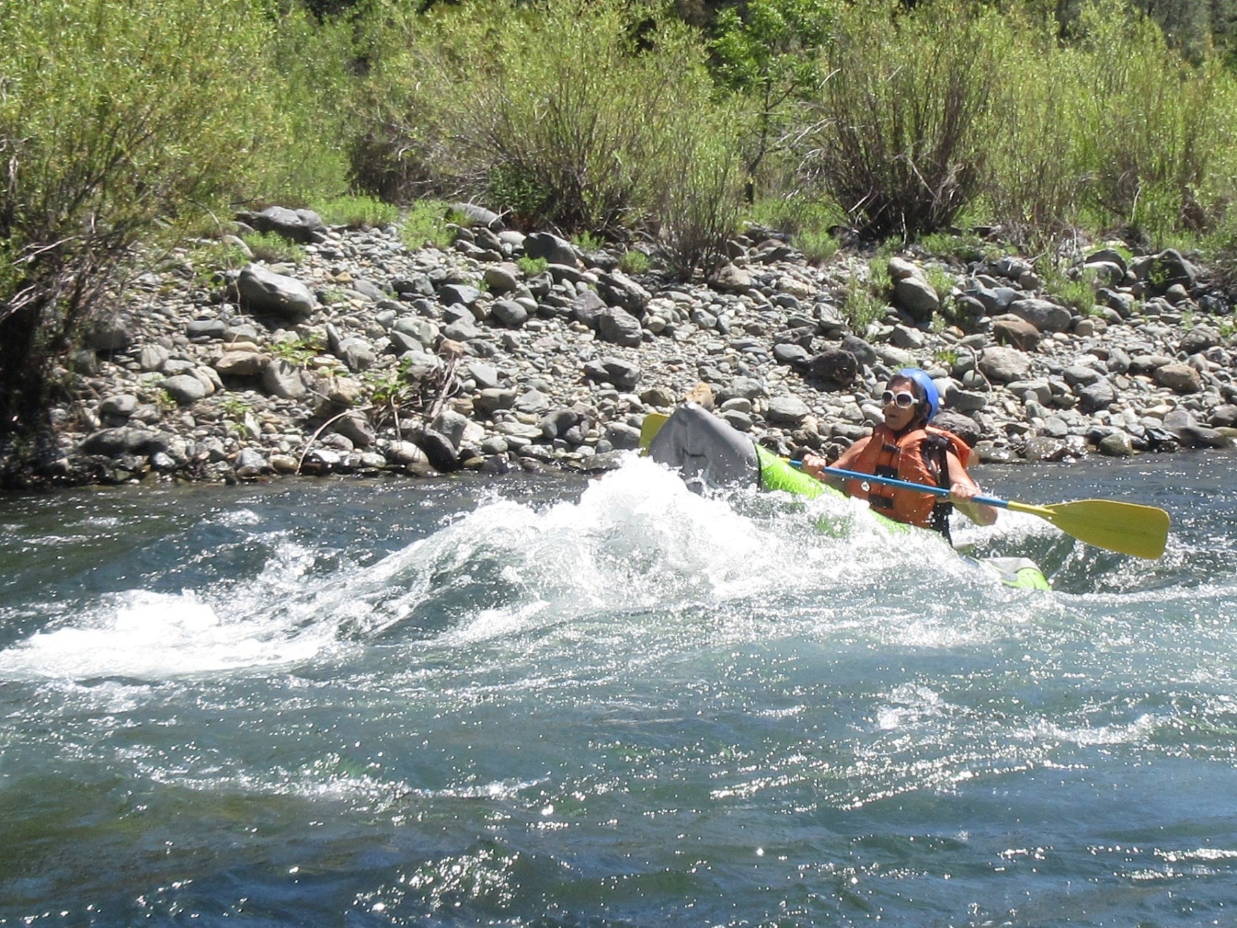 a man riding a wave on top of a body of water